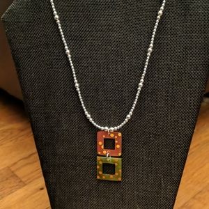 Sterling silver necklace with orange/green Glass